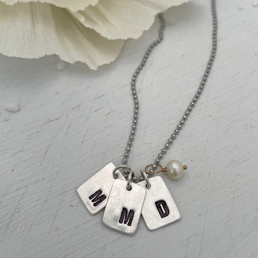 Modern initial store necklace